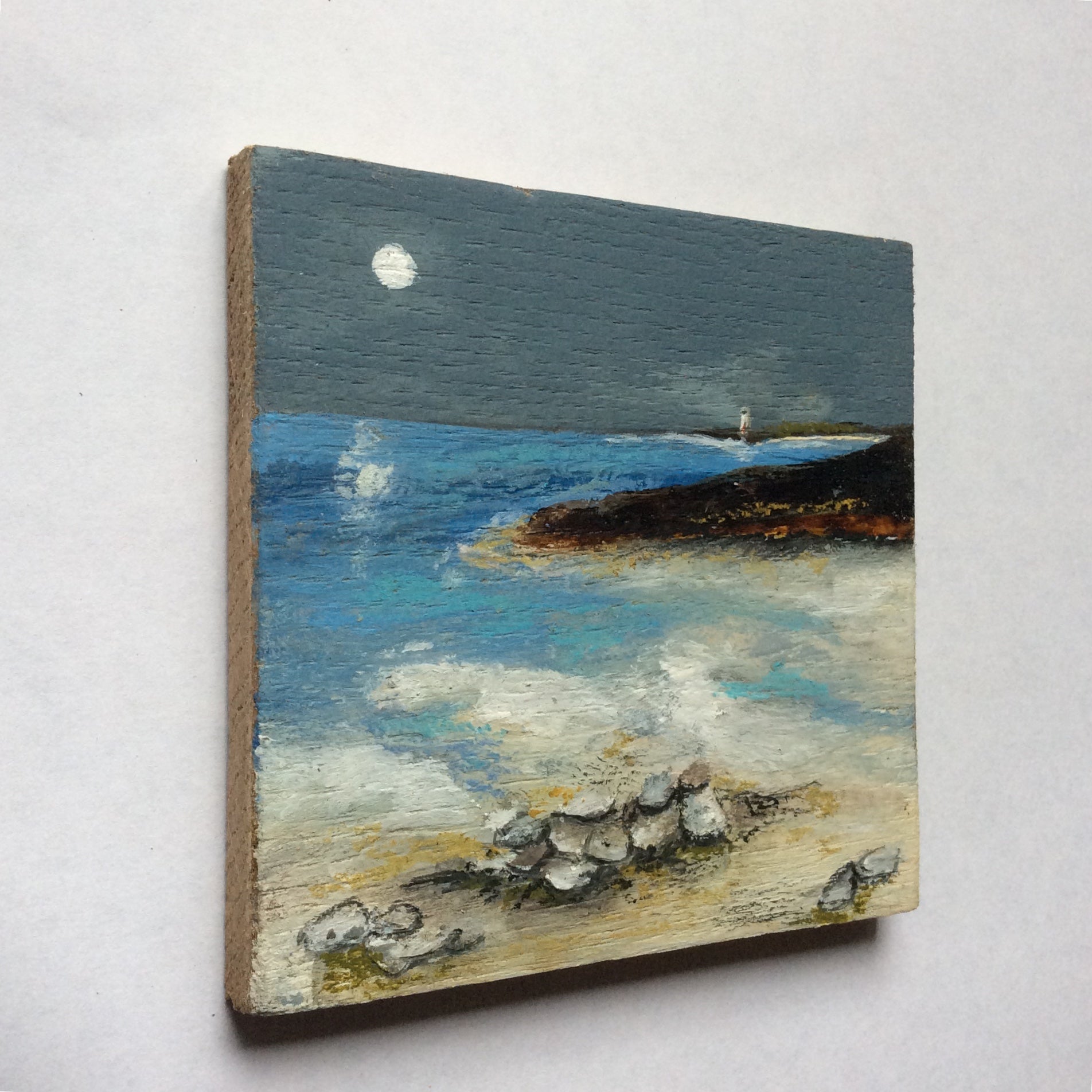 Mixed Media Art on wood By Louise O'Hara - "A lighthouse in the distance”